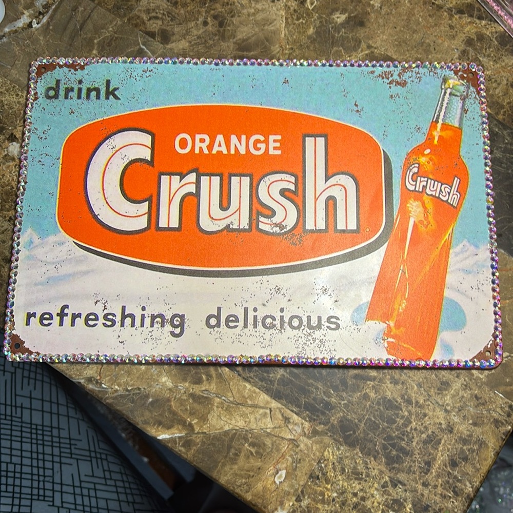 Metal orange crush sign with rhinestone’s